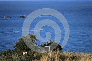 Boat at the calm sea on a sunny day