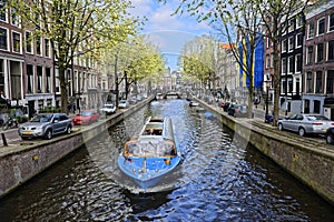 Boat on canal in Amsterdam