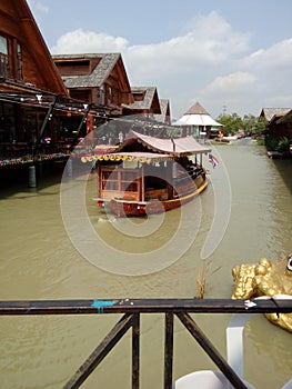 The boat in the cannal at the Floating Market