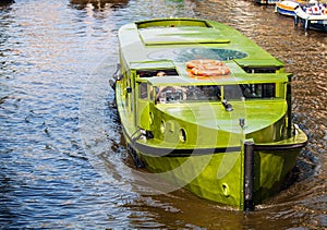Boat on channel in Amsterdam - Holland