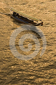 Boat on Chao Phraya, Bangkok, Thailand photo