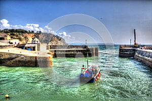 Boat in Charlestown harbour near St Austell Cornwall England UK in creative HDR photo