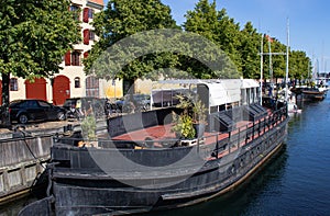 Boat on the Christianshavn canal in Copenhagen. Summer in Denmark.