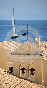 Boat and church in Corfu, Greece