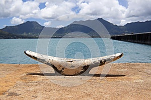 Boat cleat with mountain background
