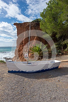 Boat in the cove sa caleta in Ibiza