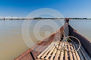 Boat crossing Irrawady (Ayeyarwady) river in Sagaing near Mandalay, Myanm