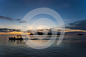 Boat cruising at dawn