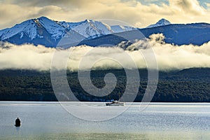 Boat cruising in te anu lake southland new zealand