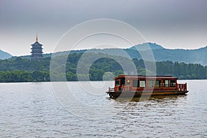 Boat cruising the West Lake in Hangzhou, China