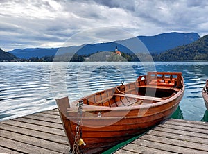 boat and dark blue water of lake Bled. Slovenia