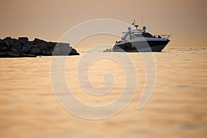 Boat with dinghy in Adriatic sea