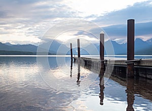 Boat Dock in Glacier National Park`s Lake McDonald with a Reflection in the Lake`s Ripples