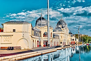 Boat dock near Vajdahunyad Castle Hungarian-Vajdahunyad vara with lake reflection. Budapest, Hungary photo