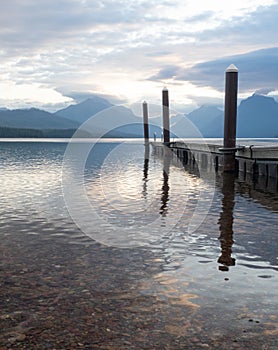 Boat Dock with Reflection in Lake McDonald in Glacier National Park, Montana, at Dawn photo