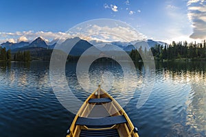 Boat on the dock surrounded mountains