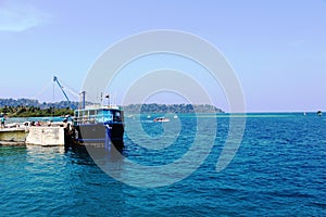 Boat docked at a jetty in Port Blair