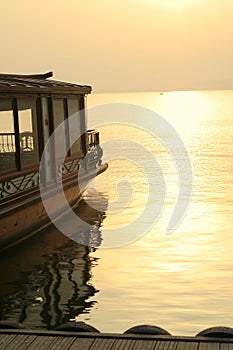 Boat docked on lake