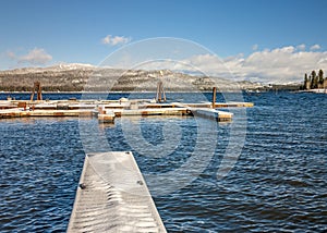 Boat Docs covered with snow at an Idaho lake