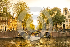 Boat on the Evening Canal in Amsterdam