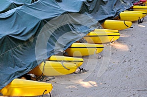 Boat floater as line on sand