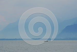 Boat floating on Geneva lake in Montreux Switzerland