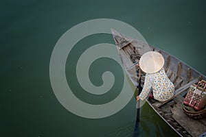 Boat floating slowly on river