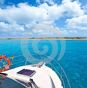 Boat in Formentera island on llevant beach photo