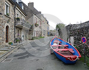 Boat going on land in France, jokingly, colors of the boat are magnificent, on land due to storm or maintenance