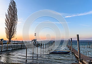 Boat harbor and jetty on Lake Constance, Berlingen, Canton of Thurgau, Switzerland photo