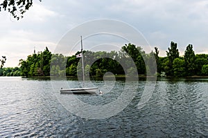 Boat on the Herastrau lake in a summer day