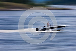 Boat at high speed photo