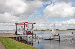 Boat hoist on the edge of the water