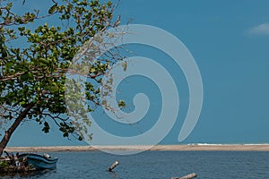 Boat in the holy river of the Kogui tribe `RÃÂ­o Ancho`, Dibulla, La Guajira - Colombia photo