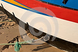 boat and hook and rope on a beach of Torreira , Portugal