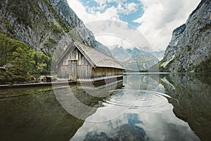 Boat house at Lake Obersee in the Alps, Bavaria, Germany