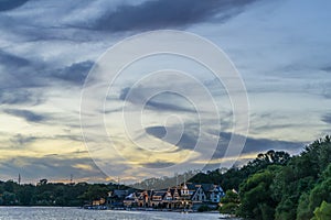 Boat house row at night