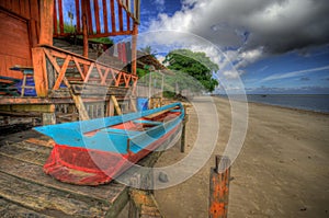 Boat on the hut photo