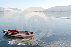 Boat in icy lake