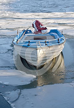 Boat in icy lake