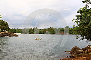 The boat in the lagoon, the area Dondra