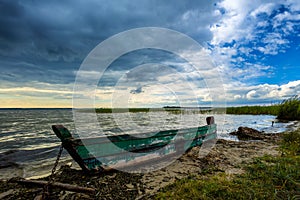 Boat on the lake shore