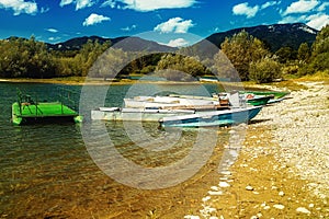 Boat on a lake shore. Lake background