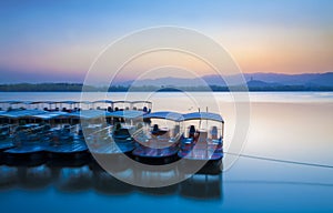 Boat on lake sunset summer palace