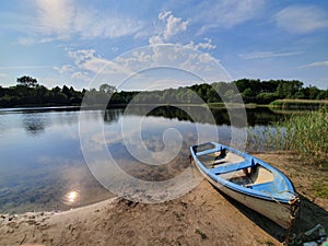 Boat on a lakeside close up on a summerday