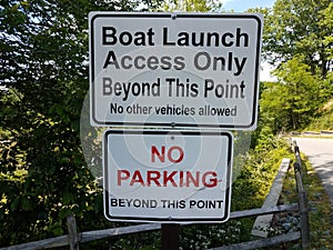 boat launch access only beyond this point no parking sign