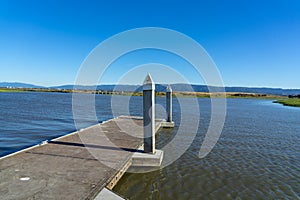 Boat Launch Dock at Palo Alto in the early sunset sunlight - California, USA