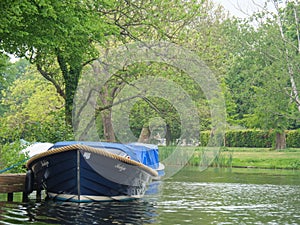 a boat with a long rope tied to it in a river