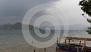 Boat in lugu lake photo