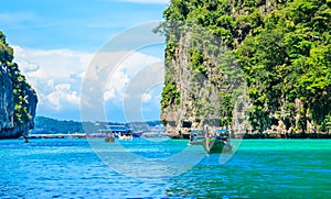 Boat in MAYA Bay Phi Phi Islands Andaman sea Krabi Thailand.